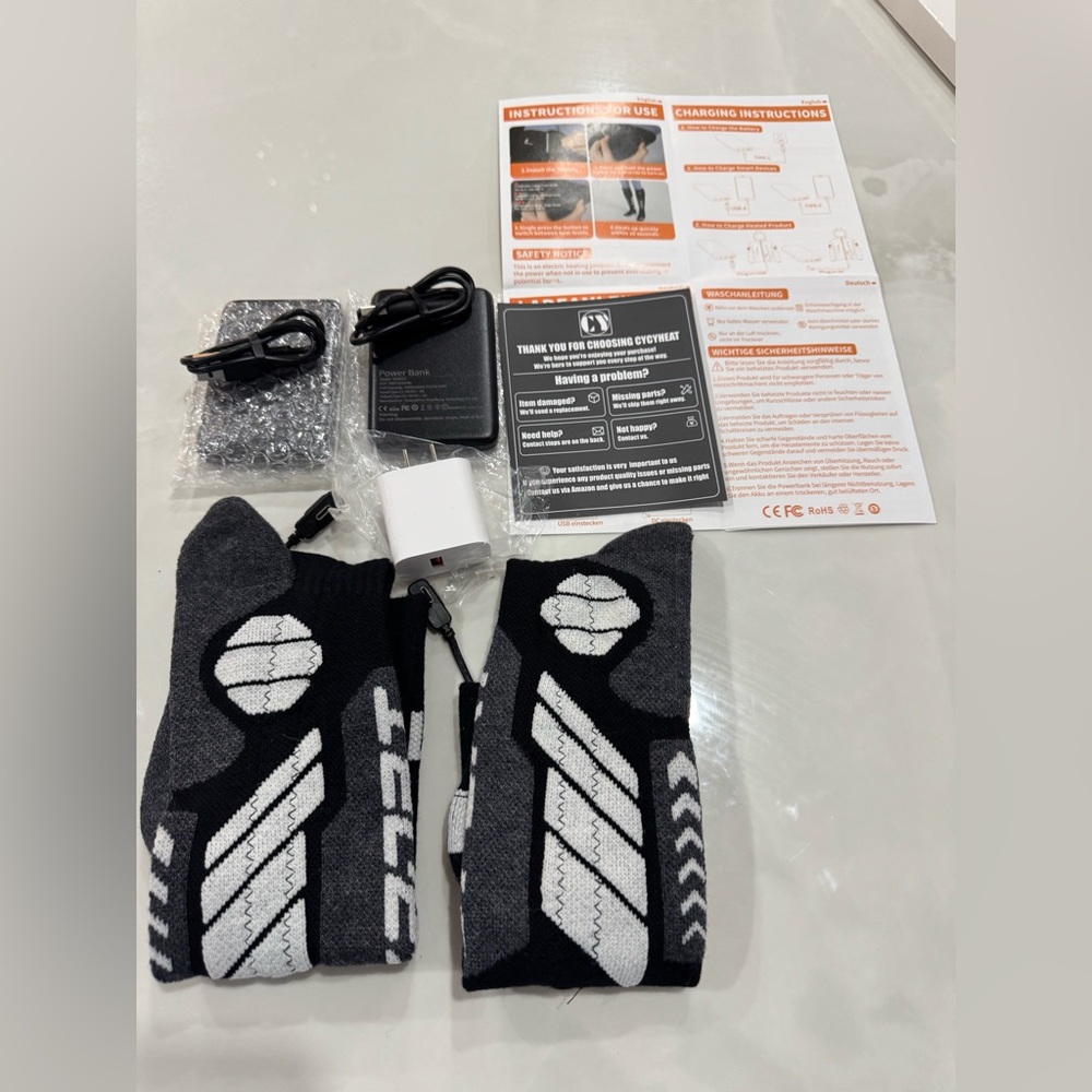 New without tags.  Electric Heated Socks Rechargeable with Battery Pack